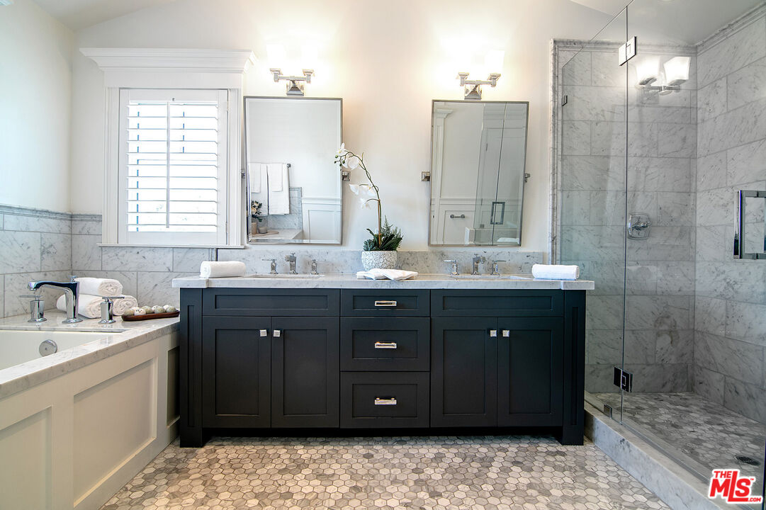 2737 Angus Street Los Angeles, CA 90039 - Photo 27 of 56 a bathroom with a sink vanity granite and a mirror