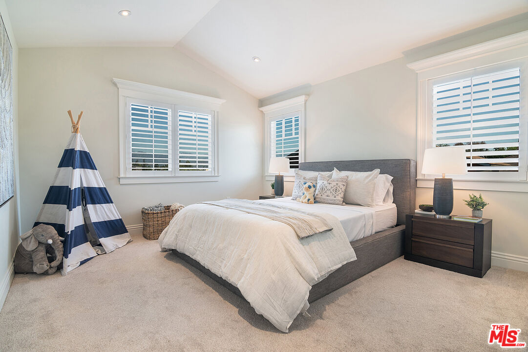 2737 Angus Street Los Angeles, CA 90039 - Photo 28 of 56 a bedroom with a bed and a window