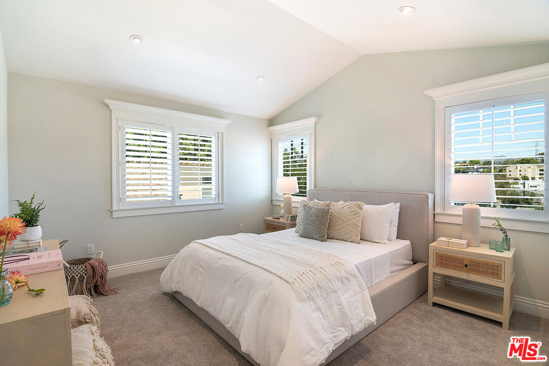 2737 Angus Street Los Angeles, CA 90039 - Photo 30 of 56 a bedroom with a bed and a couch