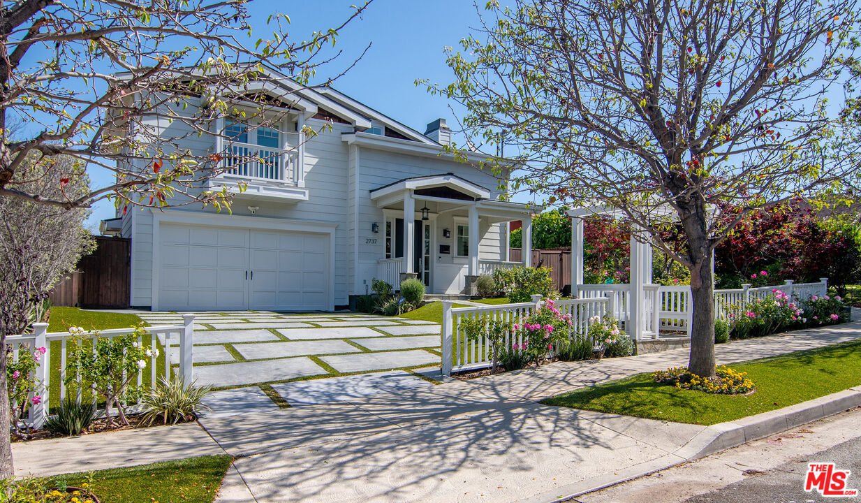 2737 Angus Street Los Angeles, CA 90039 - Photo 3 of 56 a front view of a house with garden
