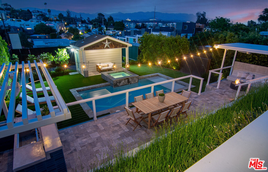 2737 Angus Street Los Angeles, CA 90039 - Photo 40 of 56 a view of a chairs and table in the terrace