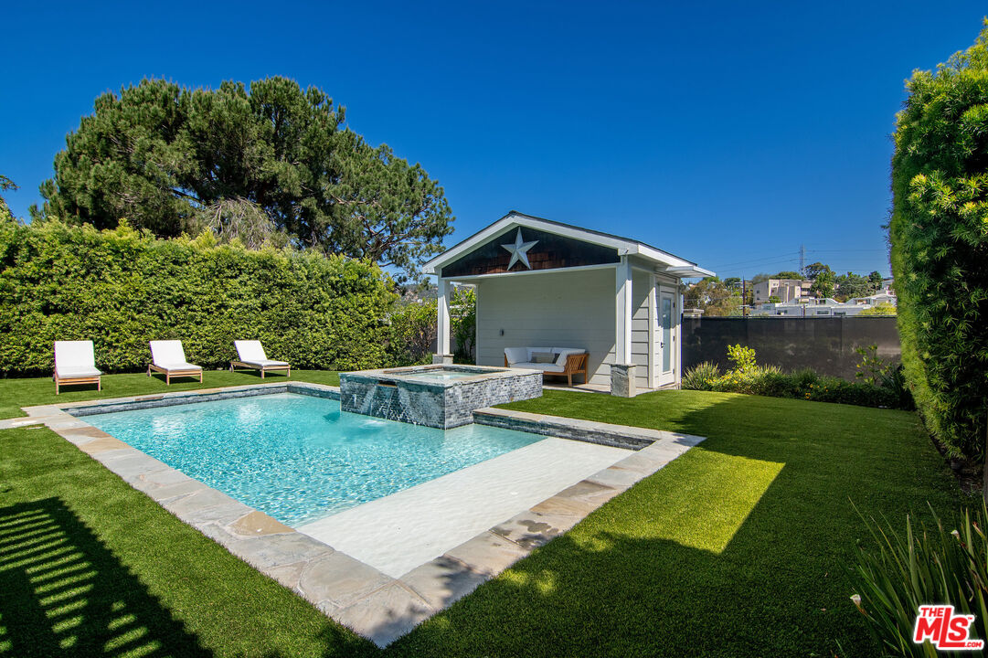 2737 Angus Street Los Angeles, CA 90039 - Photo 42 of 56 a view of a house with swimming pool and a yard