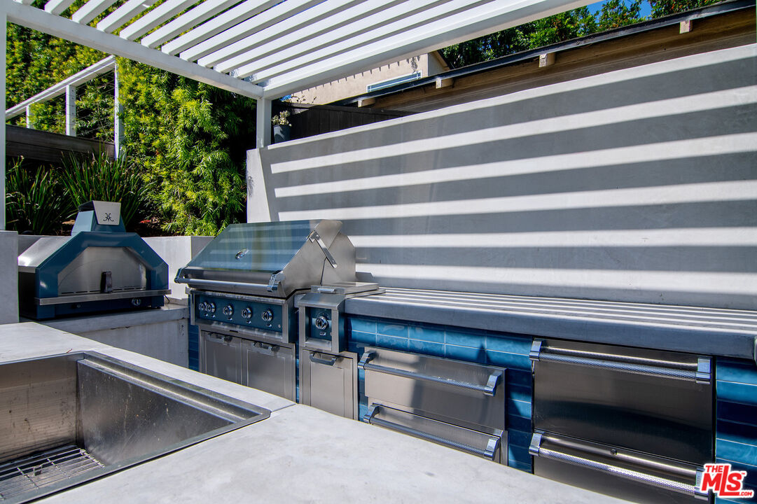2737 Angus Street Los Angeles, CA 90039 - Photo 50 of 56 a kitchen with a stove and a microwave