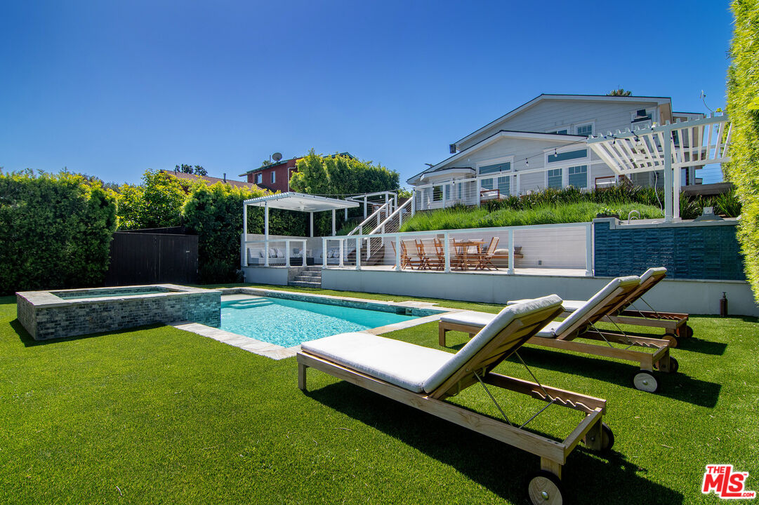 2737 Angus Street Los Angeles, CA 90039 - Photo 51 of 56 a view of an house with swimming pool and deck