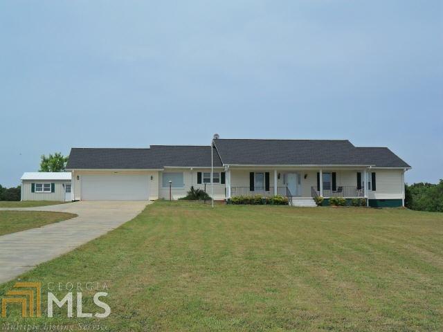 3154 Jackson Bridge Road, Unit TRACT Carnesville, GA 30521 - Photo 1 of 1 a house view with a garden space