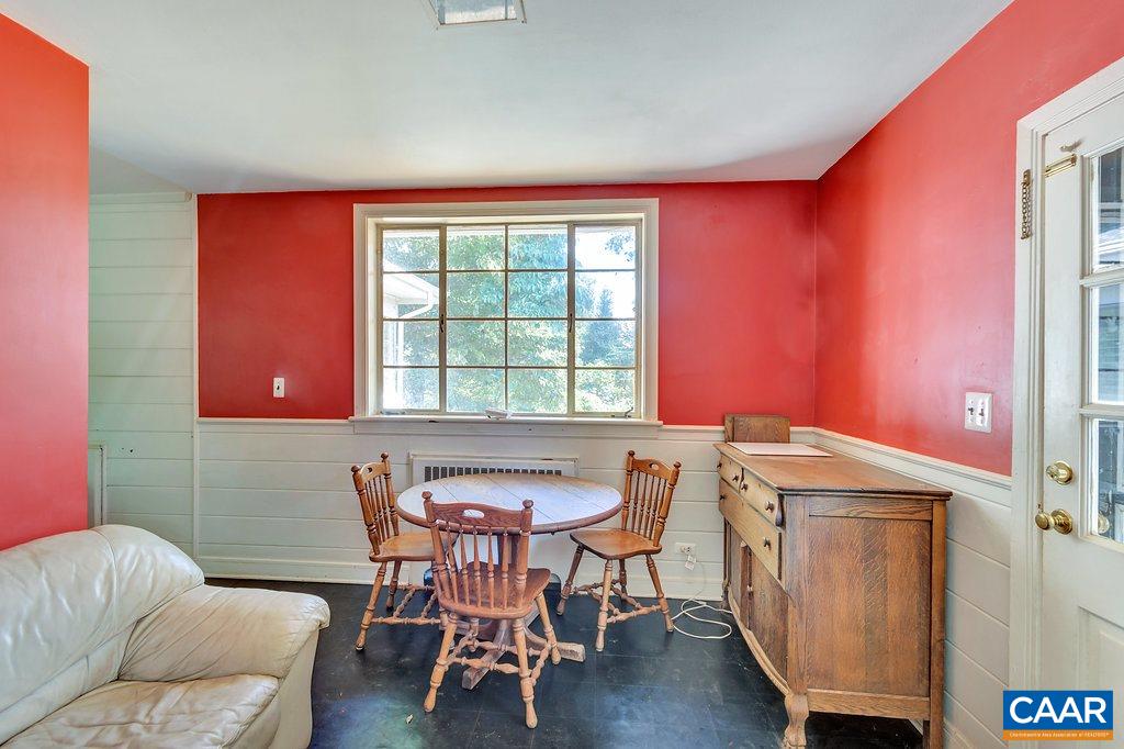 1628 St Annes Road Charlottesville, VA 22901 - Photo 13 of 20 a dining room with furniture and wooden floor