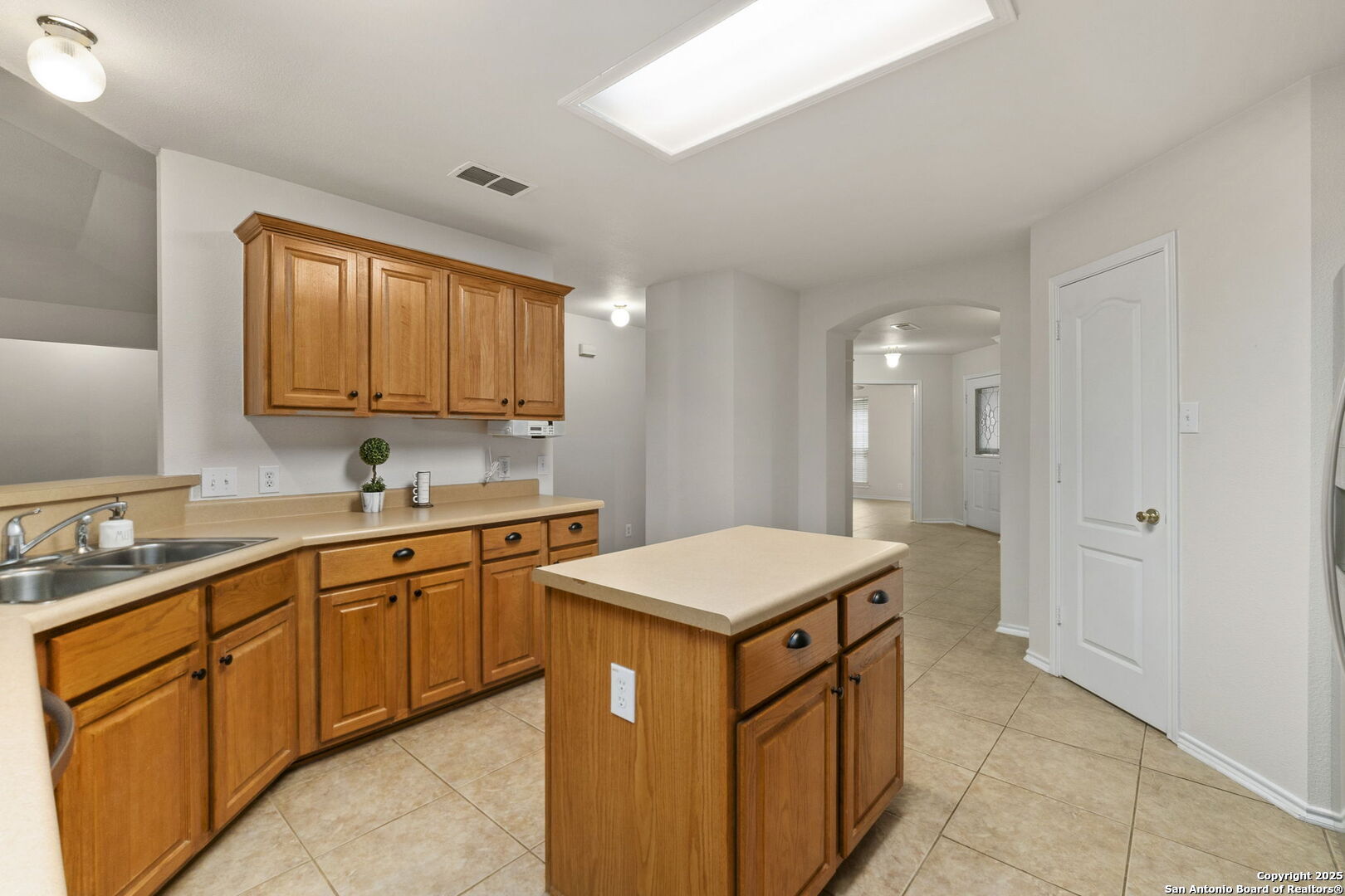 15311 Spring Rock San Antonio, TX 78247 - Photo 14 of 32 a kitchen with stainless steel appliances granite countertop a sink stove and refrigerator