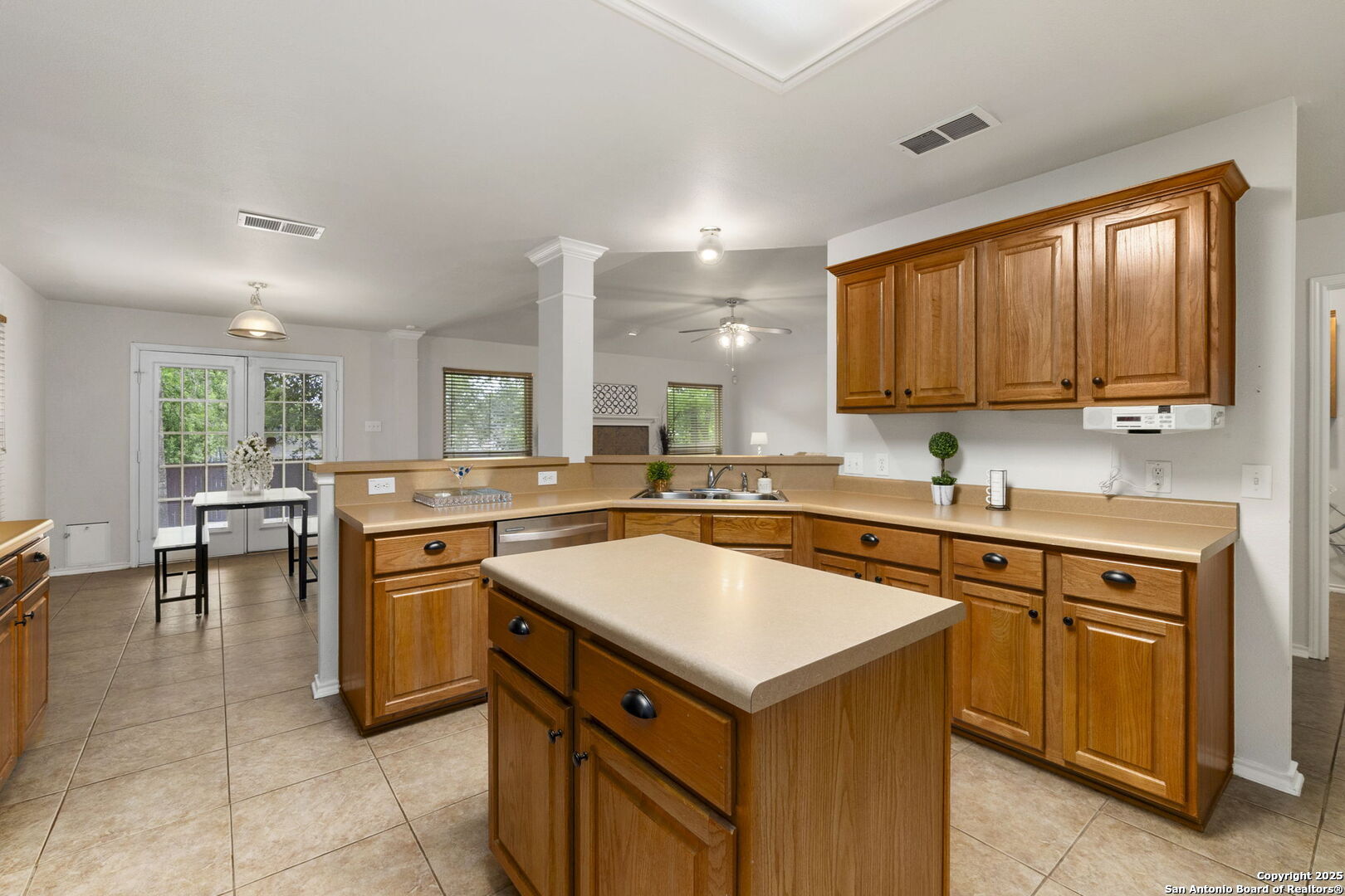 15311 Spring Rock San Antonio, TX 78247 - Photo 15 of 32 a kitchen with a sink stove and cabinets