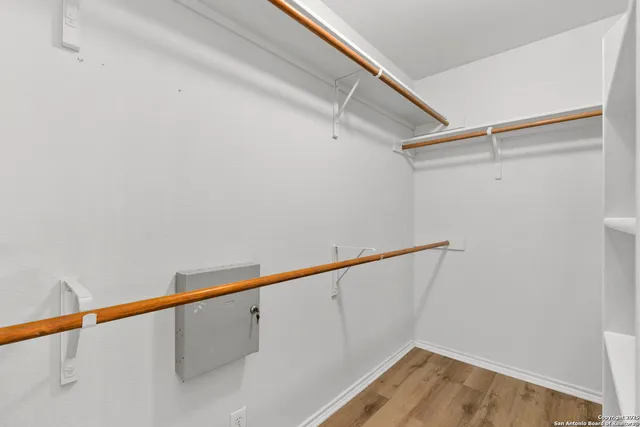 a view of small space with racks on the wall