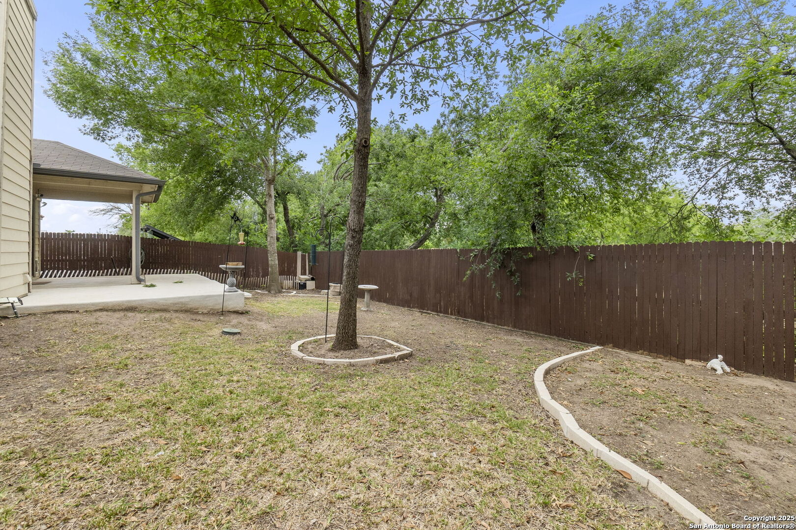 15311 Spring Rock San Antonio, TX 78247 - Photo 30 of 32 a view of a water fountain in the back yard