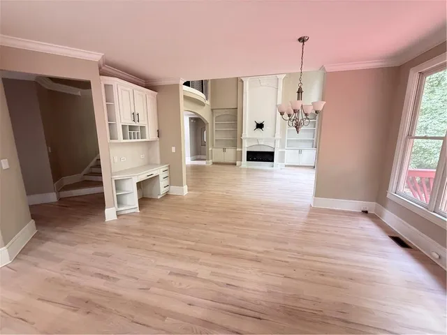 a room with a stove and a window