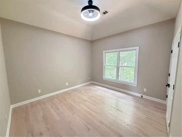 an empty room with windows