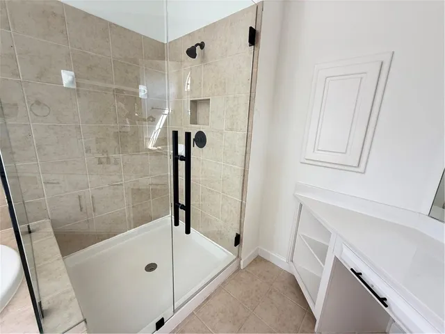 a bathroom with a sink and mirror