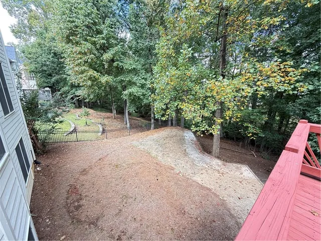 a view of a backyard with plants