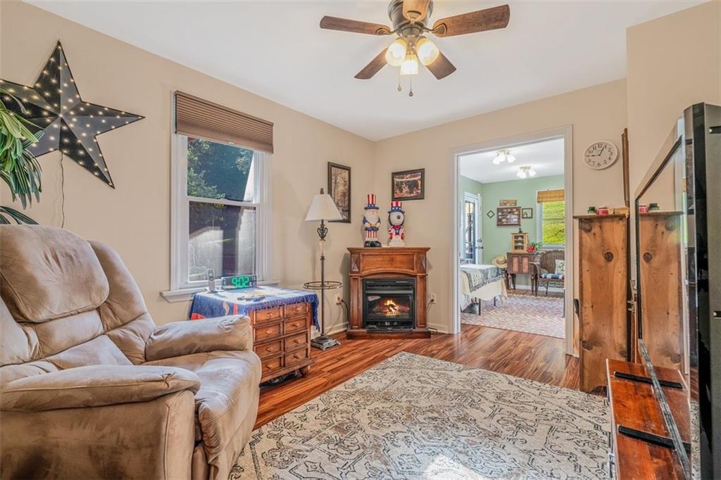 4101 Miracle Ridge Road Monongahela, PA 15063 - Photo 22 of 47 a living room with furniture and a fireplace