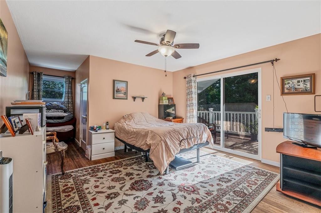 4101 Miracle Ridge Road Monongahela, PA 15063 - Photo 32 of 47 a bedroom with a bed and a television