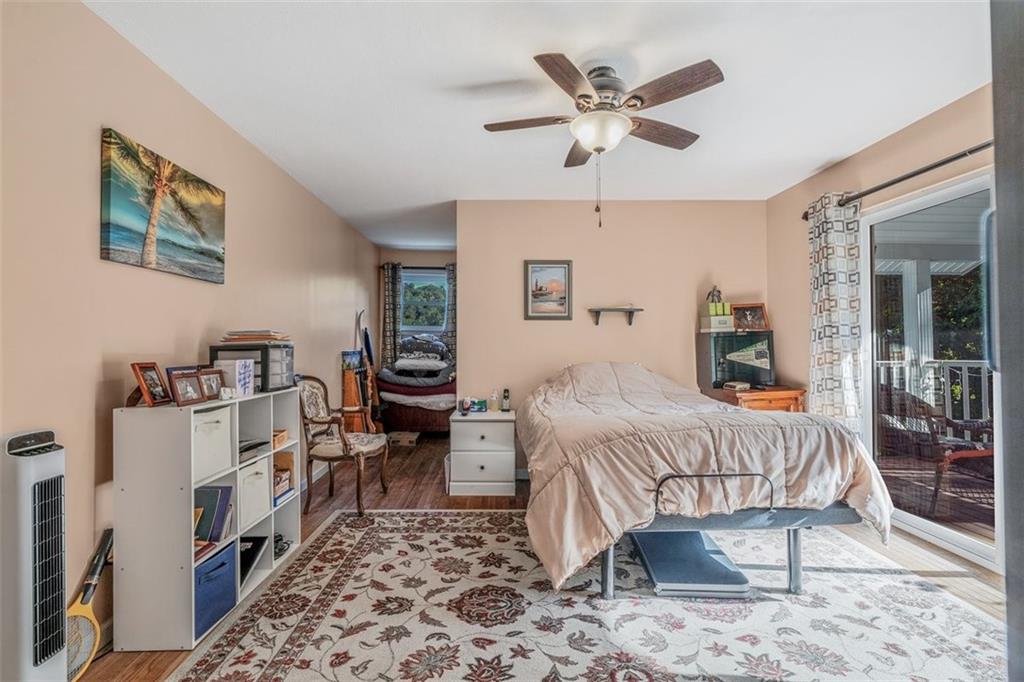 4101 Miracle Ridge Road Monongahela, PA 15063 - Photo 33 of 47 a bedroom with a bed a couch and dresser