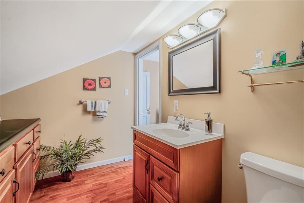 4101 Miracle Ridge Road Monongahela, PA 15063 - Photo 35 of 47 a bathroom with a sink a toilet and mirror