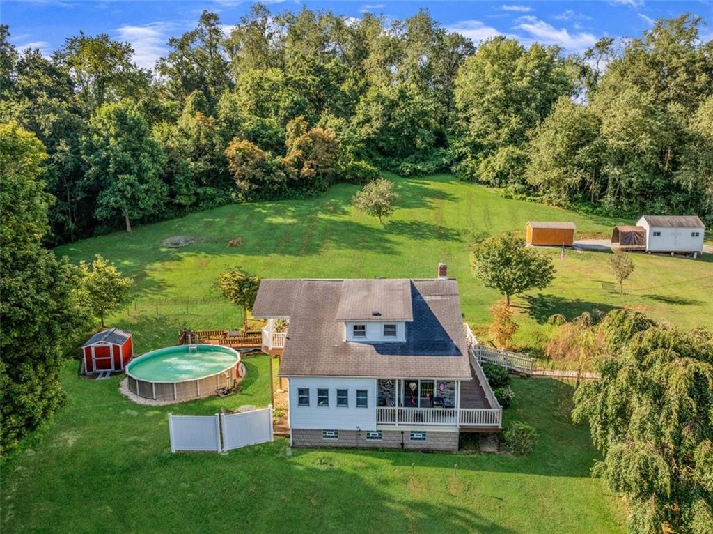 4101 Miracle Ridge Road Monongahela, PA 15063 - Photo 37 of 47 an aerial view of a house with swimming pool garden and patio