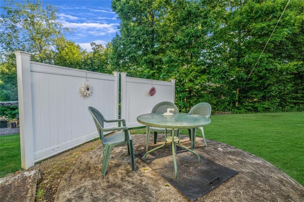 4101 Miracle Ridge Road Monongahela, PA 15063 - Photo 40 of 47 a view of a table and chairs in the garden