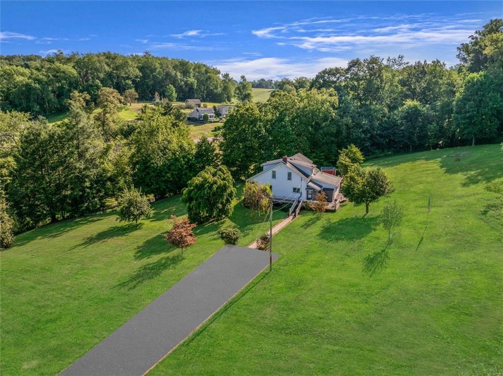 4101 Miracle Ridge Road Monongahela, PA 15063 - Photo 44 of 47 a view of a garden with a house