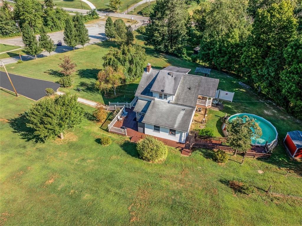 4101 Miracle Ridge Road Monongahela, PA 15063 - Photo 46 of 47 an aerial view of a house with garden space and street view