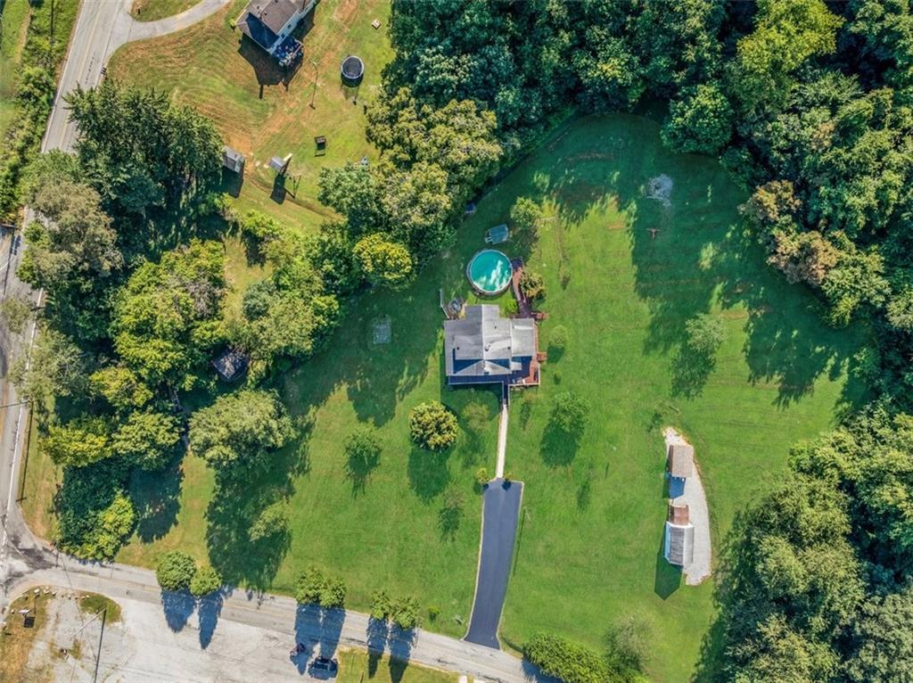 4101 Miracle Ridge Road Monongahela, PA 15063 - Photo 47 of 47 an aerial view of a house with a yard basket ball court and outdoor seating