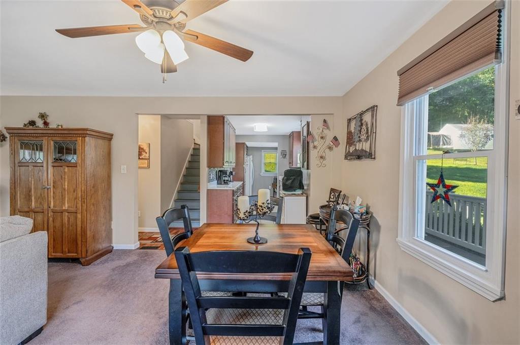 4101 Miracle Ridge Road Monongahela, PA 15063 - Photo 8 of 47 a view of a dining room with furniture window and wooden floor
