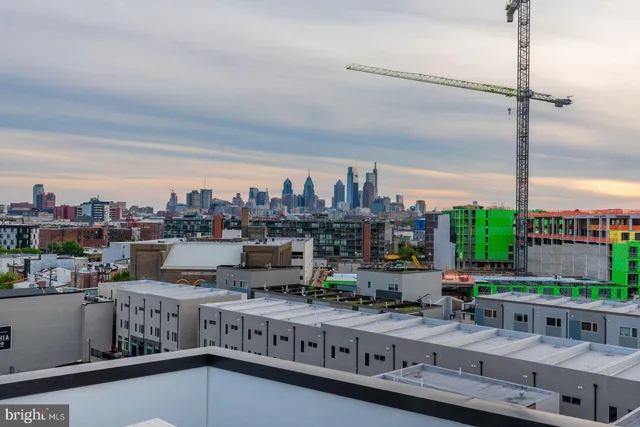 a view of a city with furniture