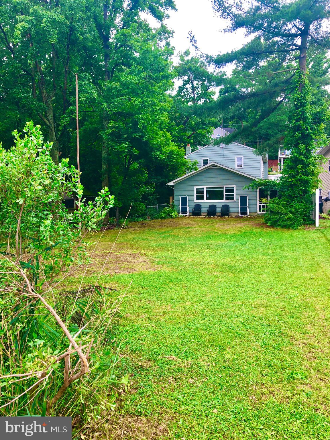 332 Arbutus Drive Edgewater, MD 21037 - Photo 18 of 31 a front view of a house with a garden