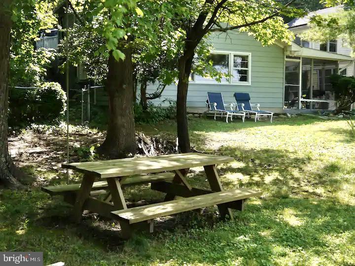 332 Arbutus Drive Edgewater, MD 21037 - Photo 21 of 31 a view of swimming pool with lounge chair