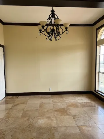 a view of a room with a window