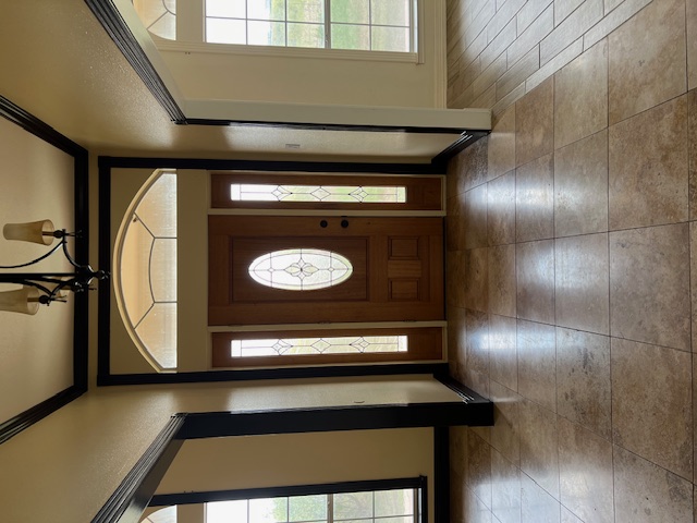1001 Schubert Lane Kyle, TX 78640 - Photo 3 of 19 a view of a hallway with wooden floor