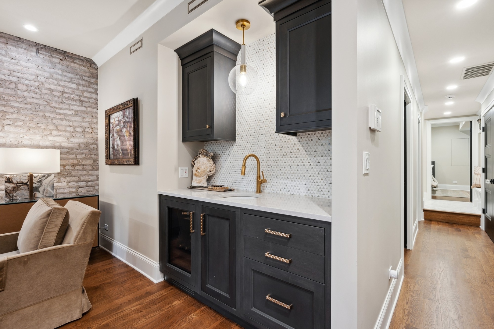 558 West Fullerton Parkway Chicago, IL 60614 - Photo 25 of 40 a en suite bathroom with a granite countertop sink and a mirror
