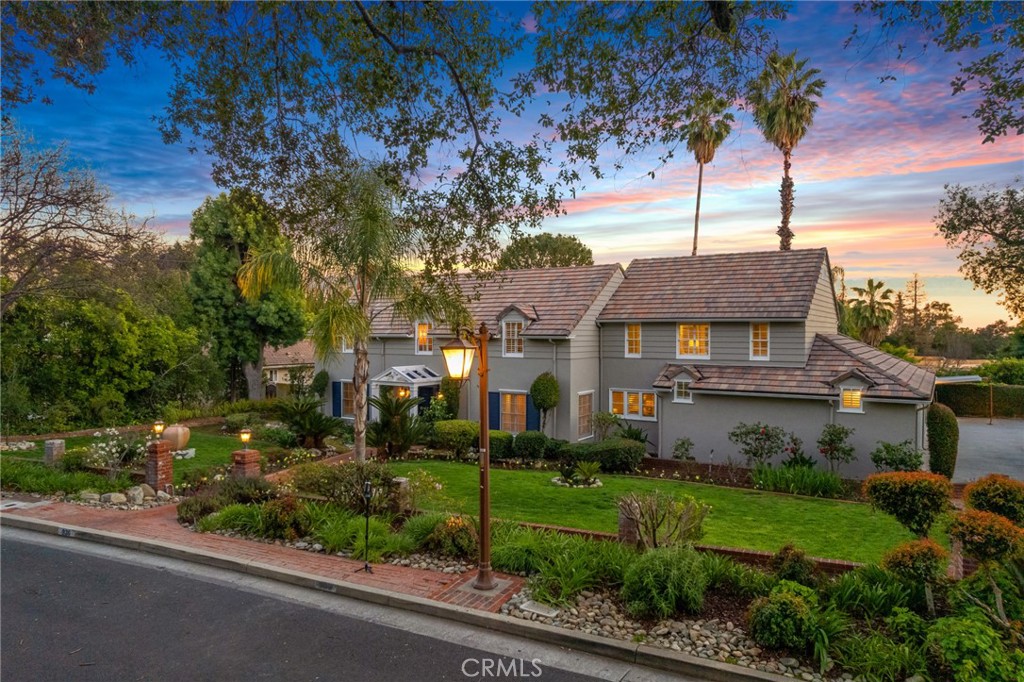 936 Hampton Road Arcadia, CA 91006 - Photo 1 of 1 a front view of a house with a yard and potted plants