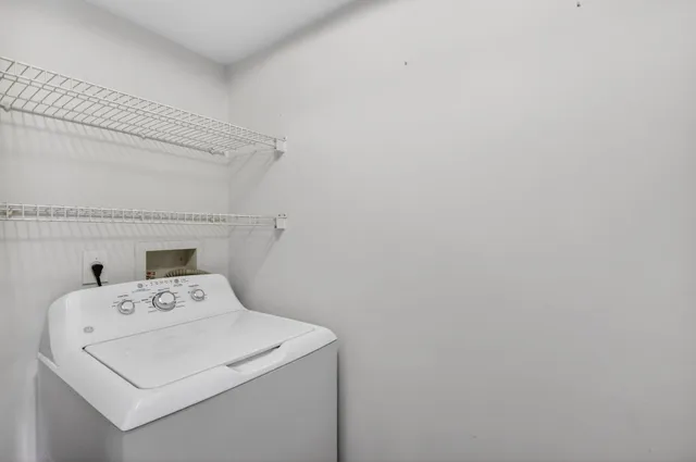 a view of balcony with wooden floor