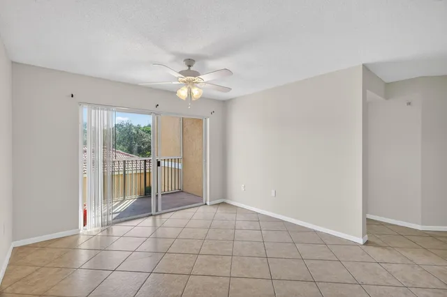 a kitchen with stainless steel appliances a refrigerator and a stove