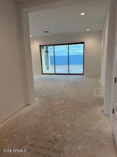 19025 West Ocotillo Road Waddell, AZ 85355 - Photo 2 of 5 a view of an empty room with a window