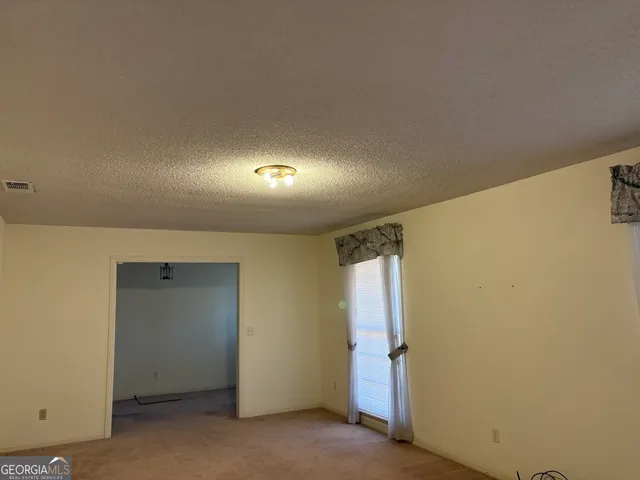 an empty room with closet