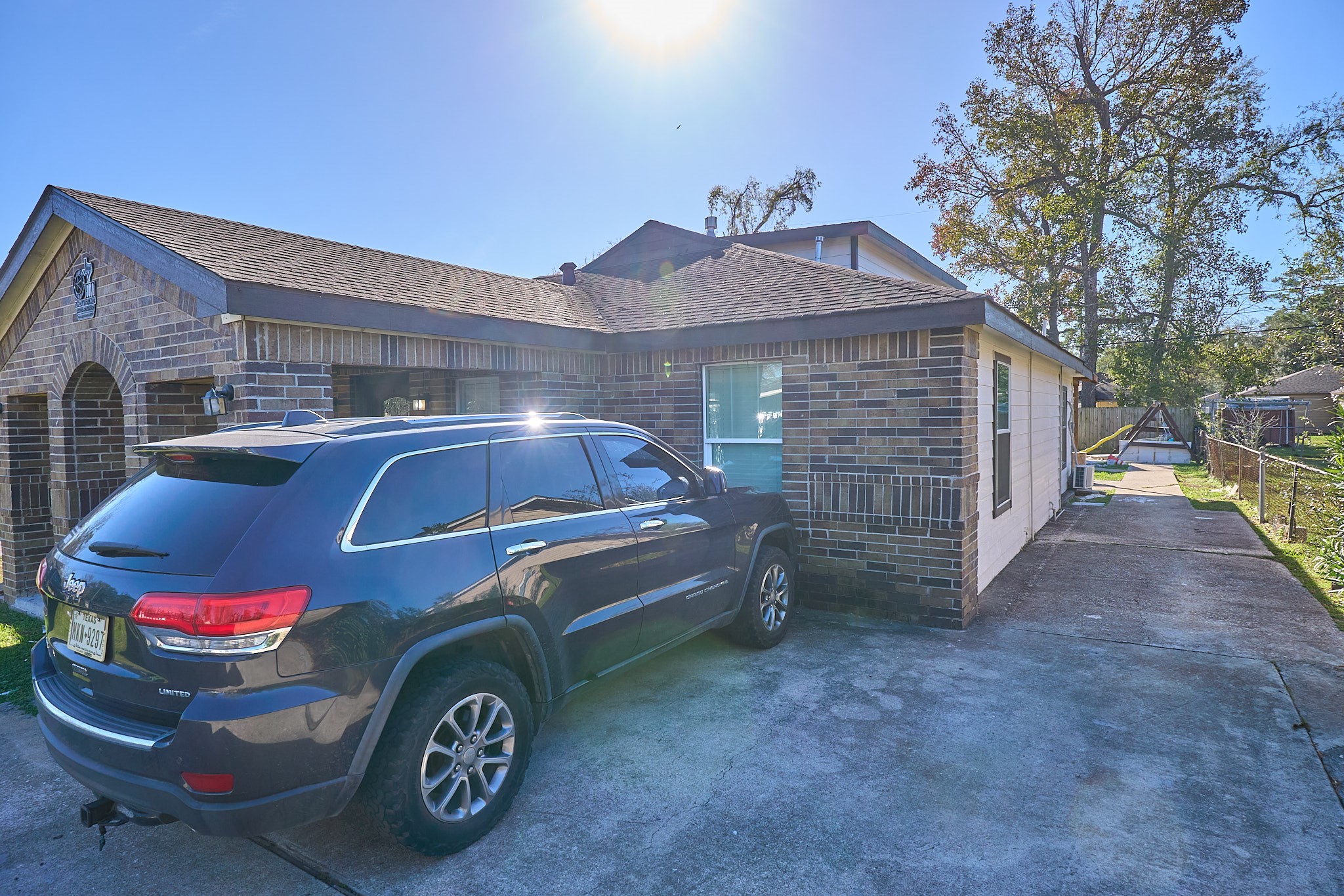 9010 Linda Vista Road Houston, TX 77078 - Photo 4 of 24 a front view of a house with parking space