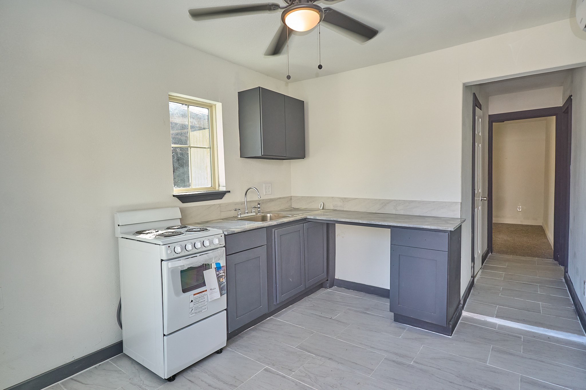 9010 Linda Vista Road Houston, TX 77078 - Photo 9 of 24 a bathroom with a sink and a mirror
