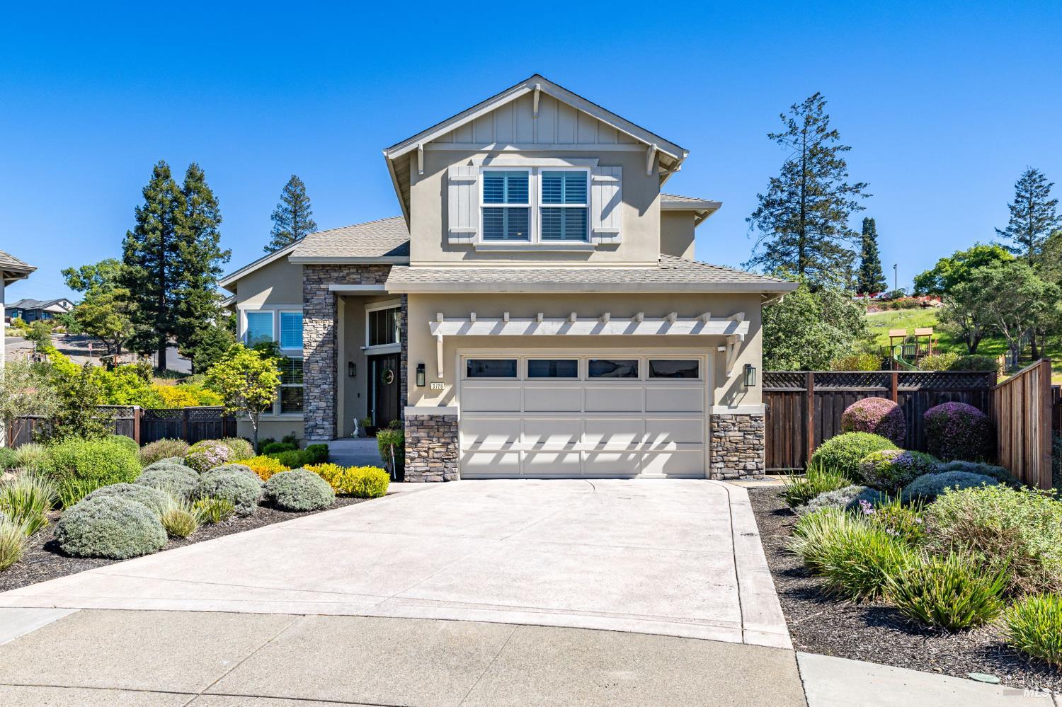 3726 Cannes Place Santa Rosa, CA 95403 - Photo 4 of 69 3726 Cannes Place is located on a quiet cul-de-sac. The owners upgraded the driveway concrete for a more appealing look. There is parking for 4 cars in the driveway. The large 2-car garage also has epoxy floor covering.
