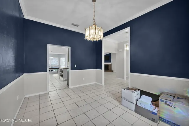 a kitchen with granite countertop cabinets a sink and appliances