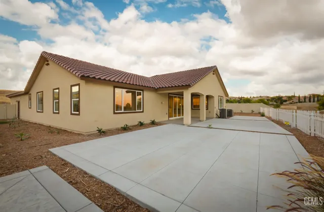 a view of a swimming pool with a lot of cars parked