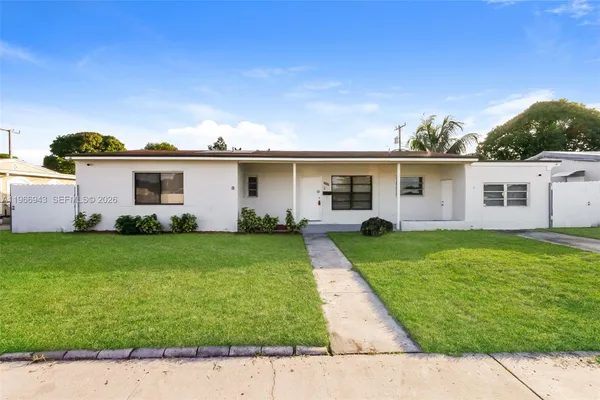 a front view of house with yard