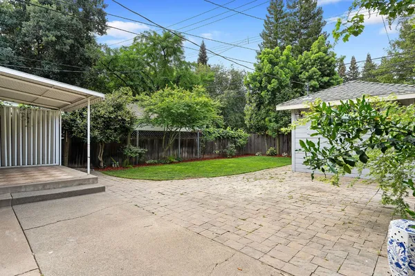 a view of backyard with green space