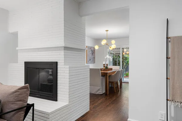 a view of a livingroom with furniture and wooden floor