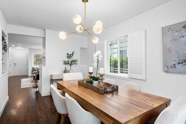a view of a dining room and a table or chandelier