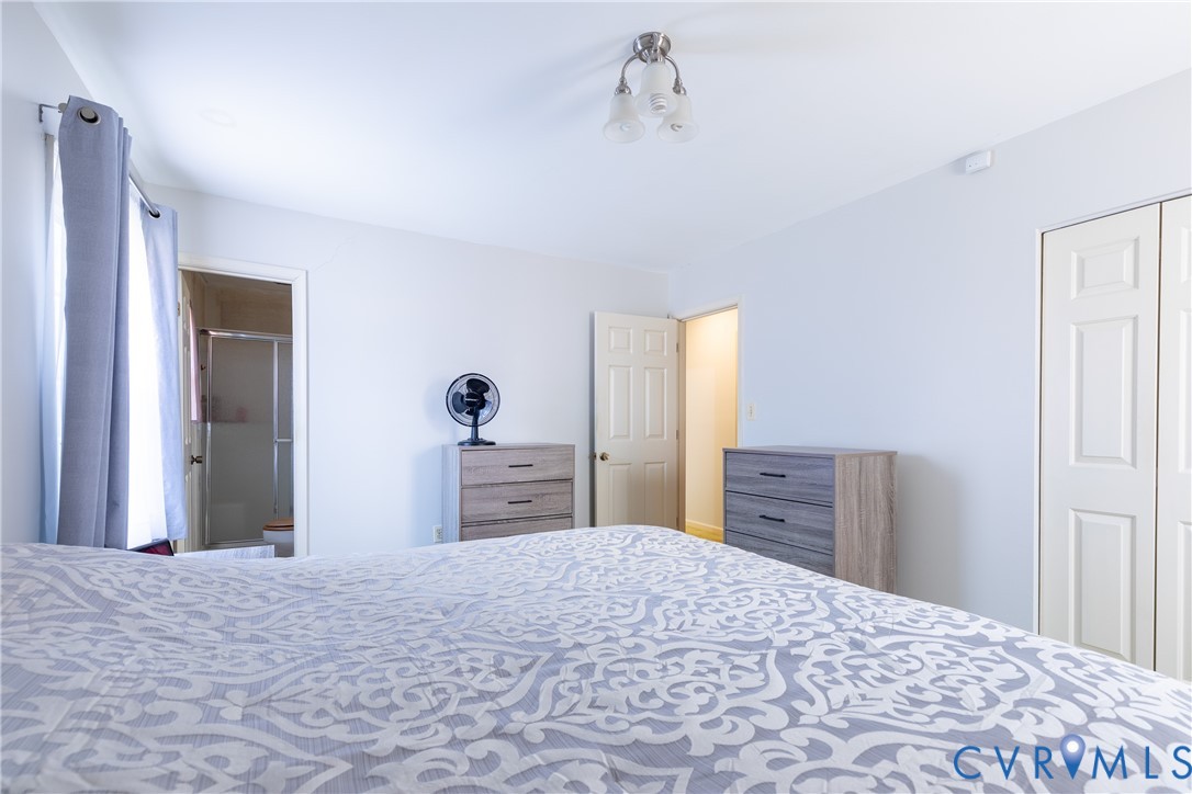 3317 Hastings Road Petersburg, VA 23805 - Photo 15 of 25 a bedroom with a bed and a dresser