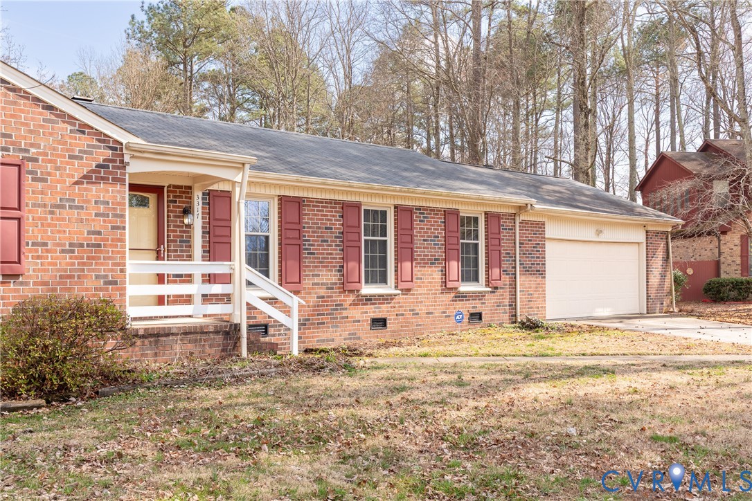 3317 Hastings Road Petersburg, VA 23805 - Photo 18 of 25 a view of a house with backyard and sitting area